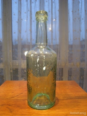 Старое стекло Кёнигсберга Бутылка из прозрачного зеленоватого стекла с надписью GEREVISIA BRAUEREI
