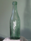 Старое стекло Кёнигсберга Бутылка из прозрачного зеленоватого стекла с надписью ....KONIGSBERG i Pr