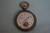 Старинные часы с календарём 