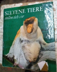 Книга альбом 1971 г. Seltene Tiere stellen sich vor Ullrich, Wolfgang редкая глянец,, цветные фото
