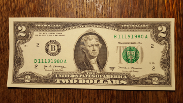 2$ доллара  UNC Номер - Год рождения 1980г.
