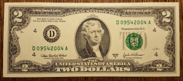 2$ доллара  UNC Номер - Год рождения 2004г.