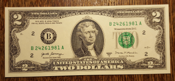 2$ доллара  UNC Номер - Год рождения 1981г.